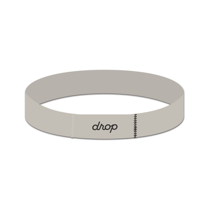 Silver bracelet with 'drop' branding on a white background